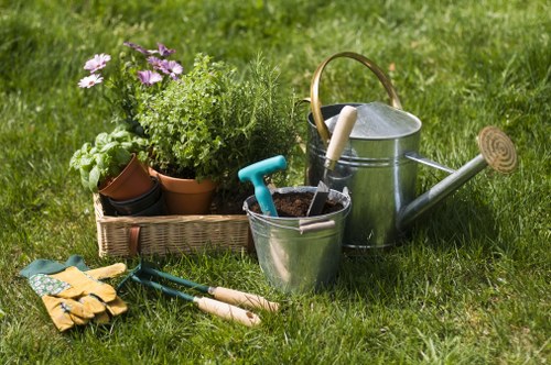 Seasonal flowers being planted in a Monken Hadley garden